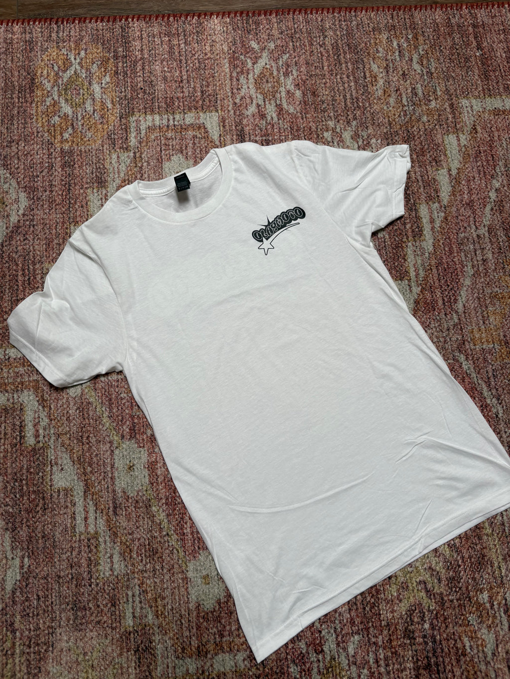 white olay moto shirt