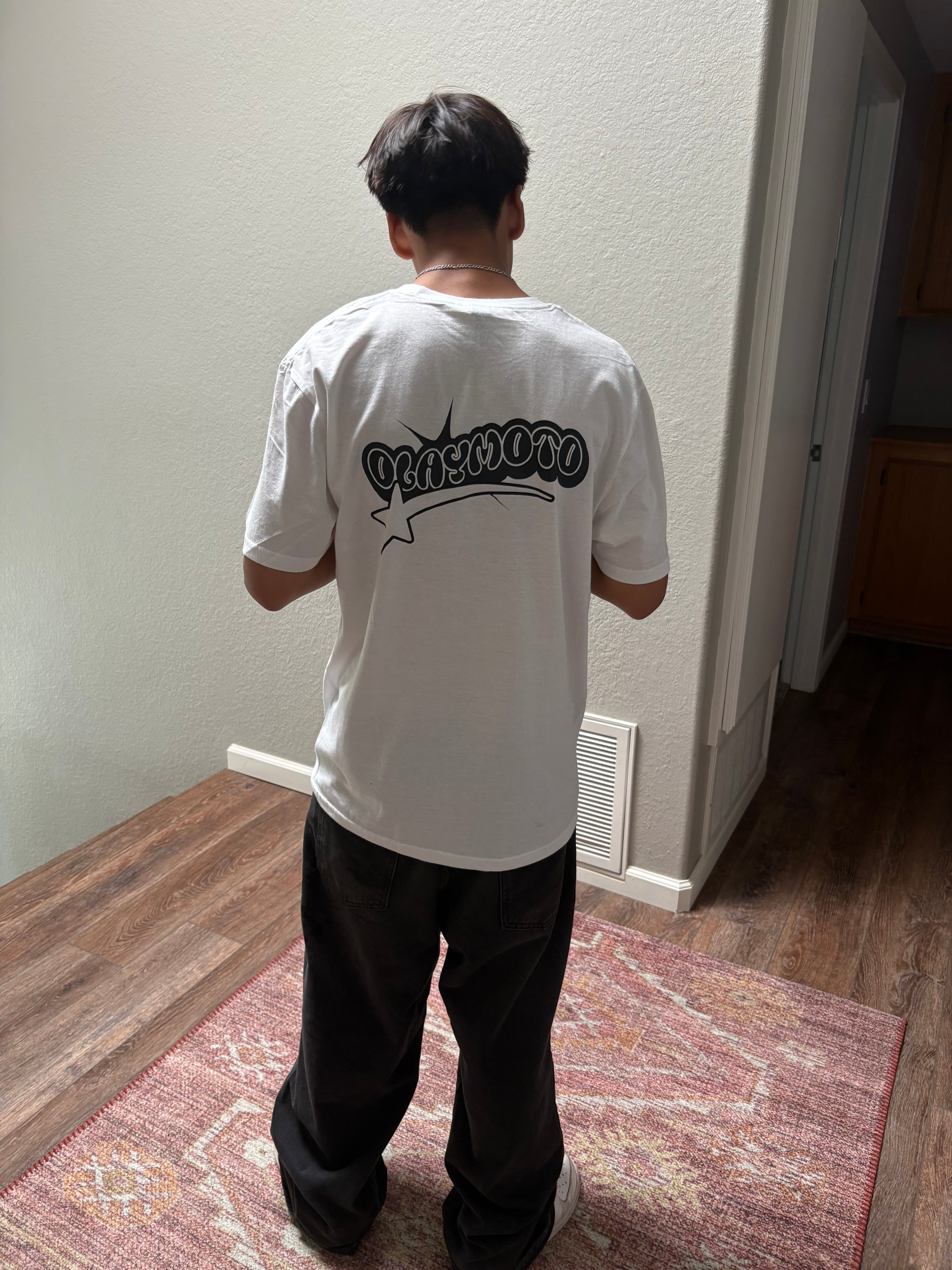 white olay moto shirt