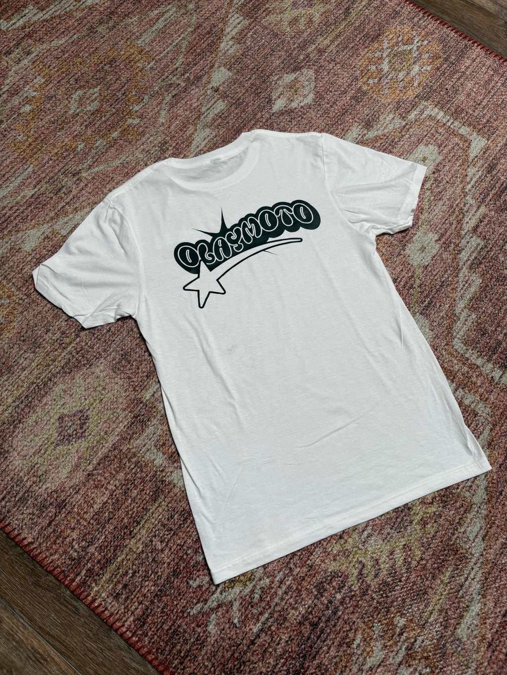 white olay moto shirt